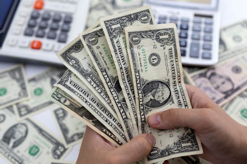 US Dollar eases as Fed minutes offer clues