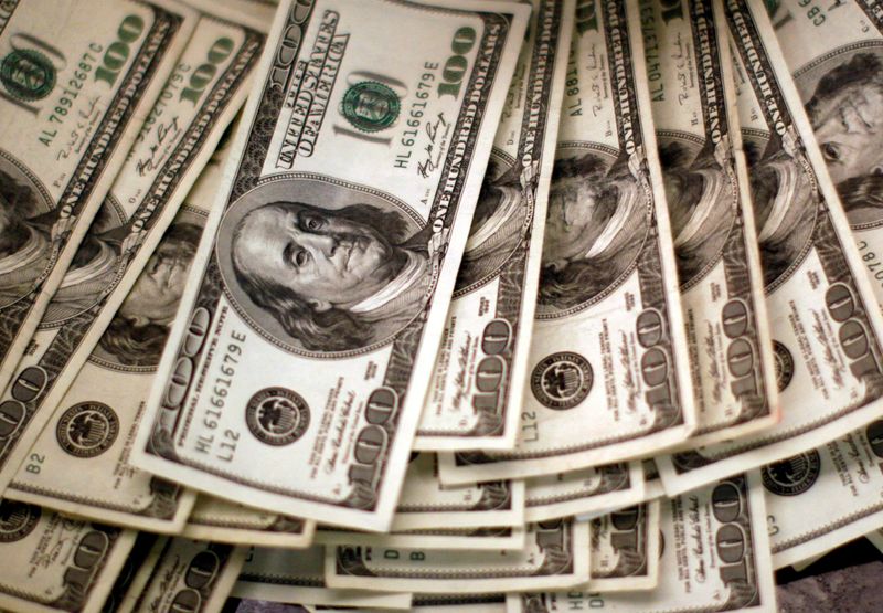 Dollar swoons as Powell soothes policy fears