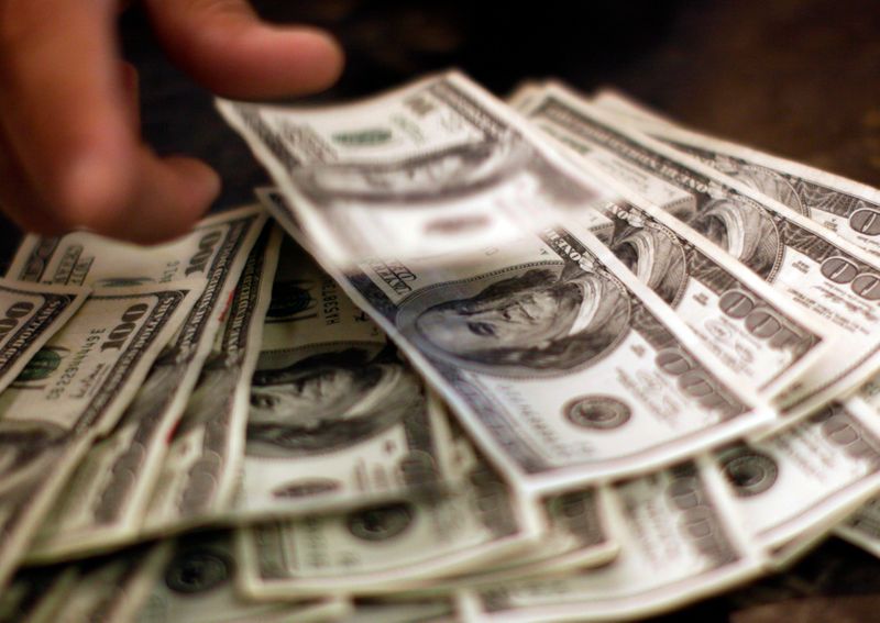 FX Signals U.S. dollar widely unchanged on greenback